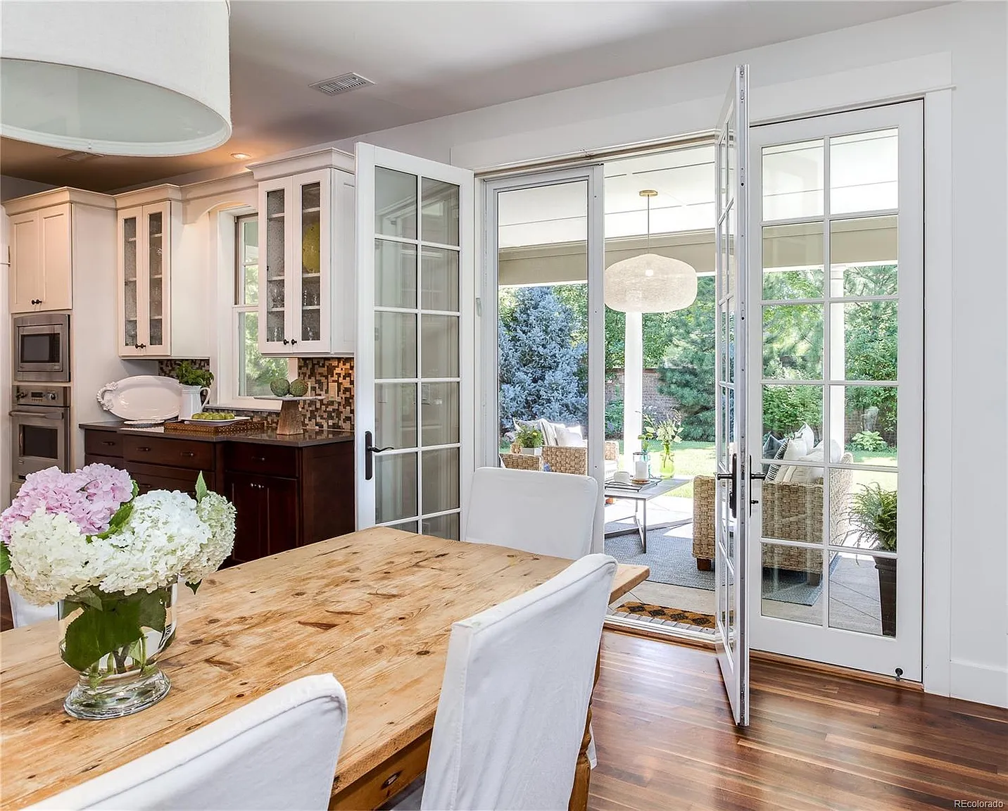 Luxury Denver home interior with elegant dining room and French doors